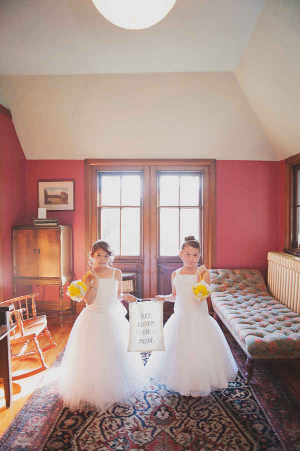 Flower Girls With Here Comes the Bride Sign