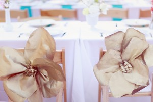 Giant Gold Paper Flowers on Reception Chairs