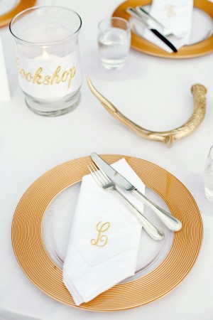 Gold Place Setting With Monogrammed Linens