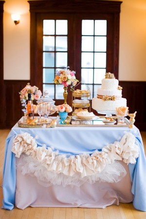 Sweets Table With Blue and White Ruffled Linens