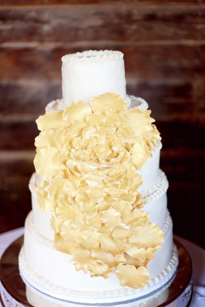Tiered Wedding Cake With Cascading Yellow Sugar Flowers