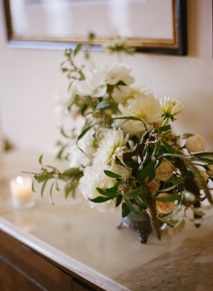 White and Green Flower Arrangement on Marble Credenza