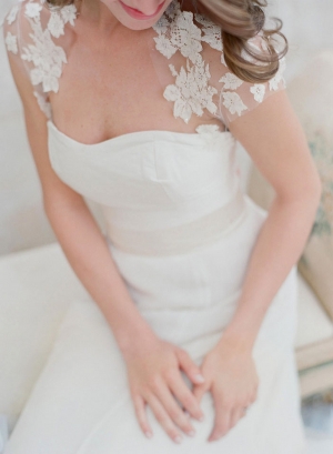 Cap Sleeve Lace Capelet Over Strapless Wedding Gown