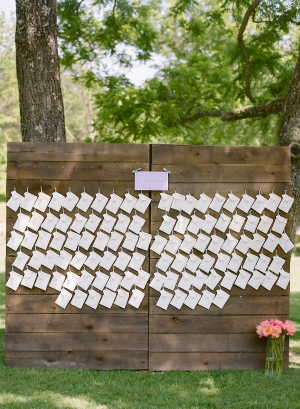 Ceremony Programs Hanging on Wood Board