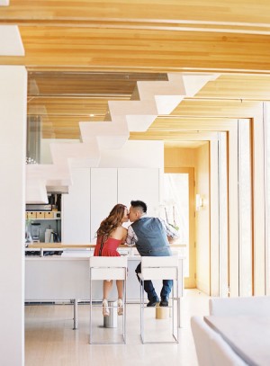 Couple Kissing in Modern Kitchen