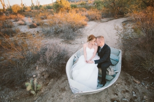 Couple in Rowboat Desert Wedding Inspiration