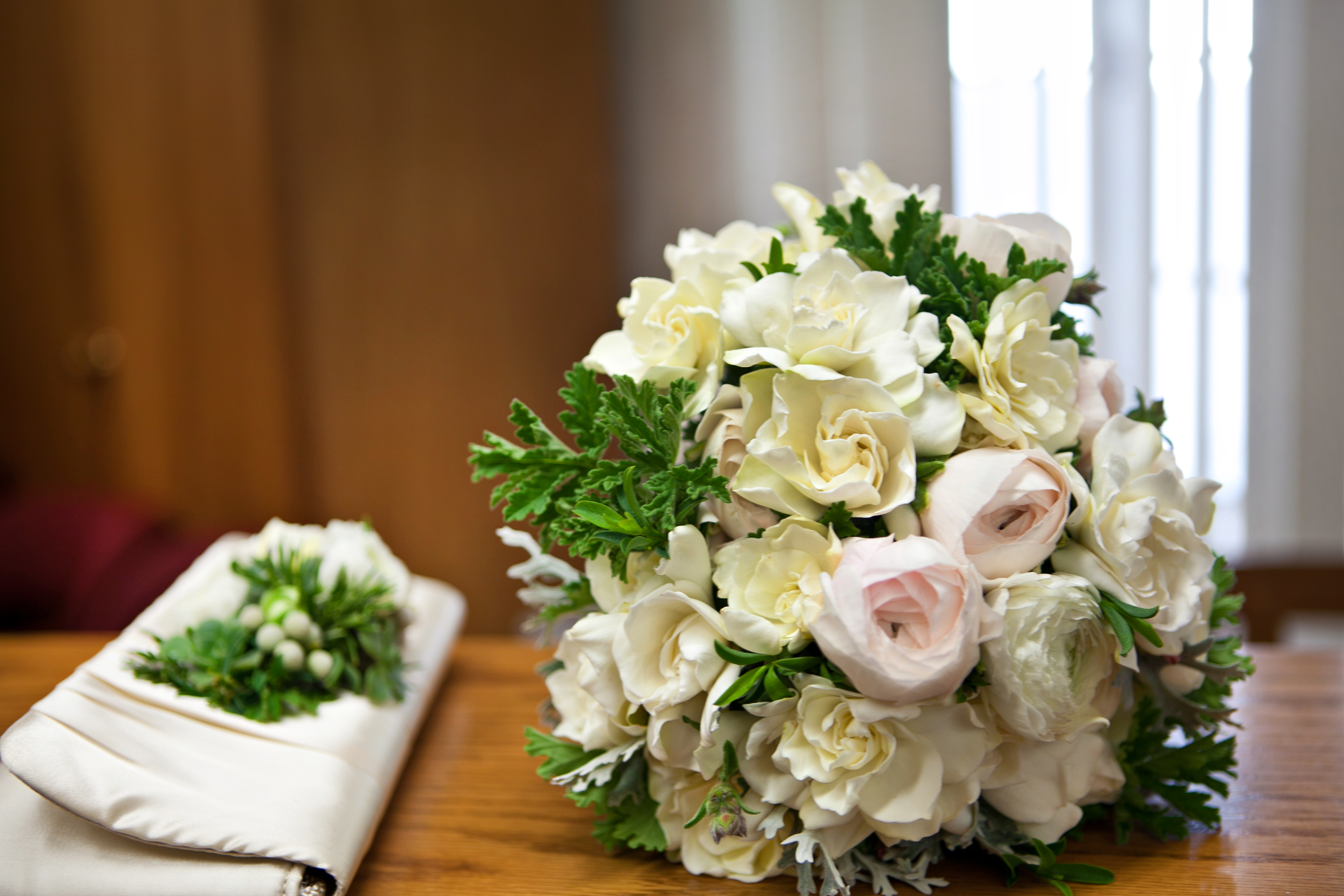 Cream and Pale Pink Bouquet With Waxy Greenery