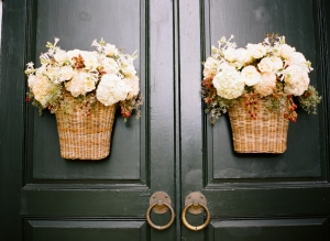 Flowers in Wicker Baskets on Church Doors