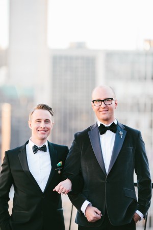 Grooms in Classic Tuxes Against Chicago Skyline