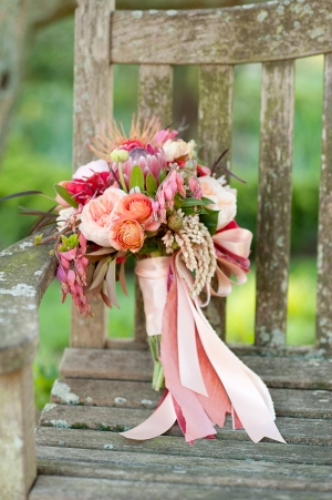 Pink Peach and Purple Bouquet With Ribbons on Rustic Chair