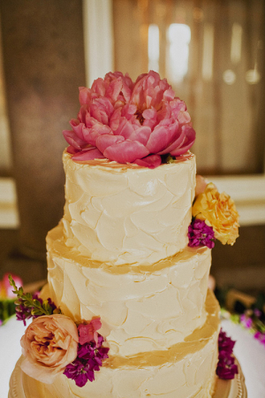 Buttercream Wedding Cake With Pink Flower Topper
