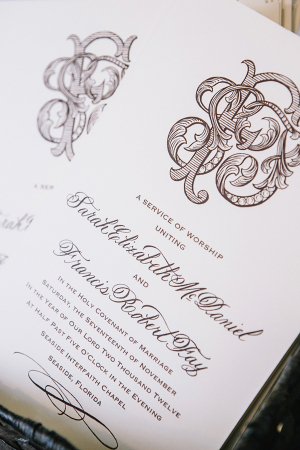 Cream and Brown Wedding Invitation With Intricate Monogram