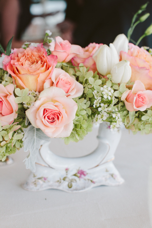 Peach and Green Flowers in Vintage Vase Reception Decor