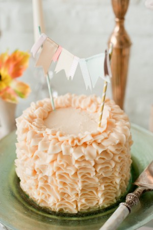 Pink Ruffle Cake with Bunting Topper