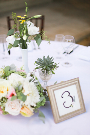 Reception Arrangements With Pale Flowers and Succulents