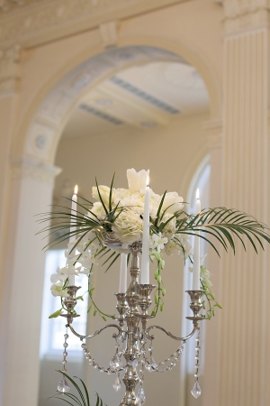 Candelabra Centerpiece With Flowers and Palm Fronds 