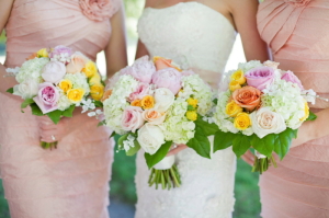 Peach Bridesmaids Dresses and White Bouquets