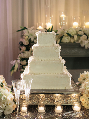 Square Tiered Wedding Cake on Silver Stand