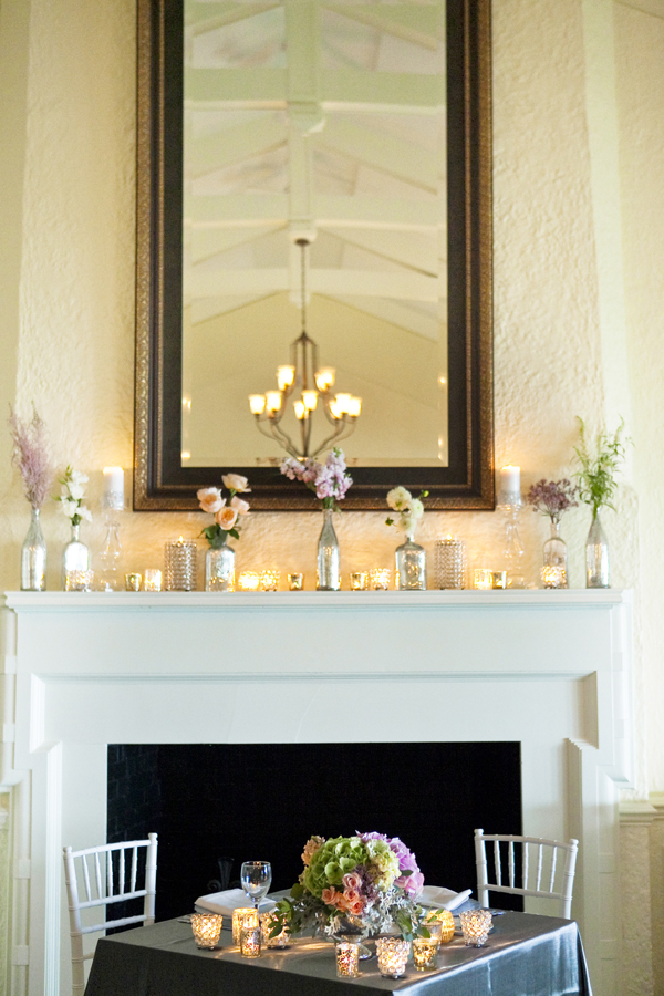 Bottles With Flowers on Mantel