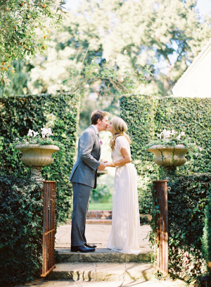 Bride and Groom Kissing in Garden