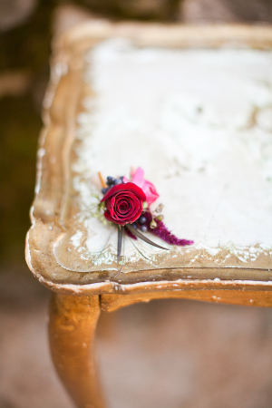 Rose Boutonniere on Vintage Gold Table
