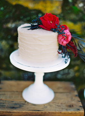 Wedding Cake With Combed Icing and Flowers