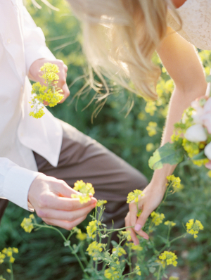 Couple Picking Yellow Flowers