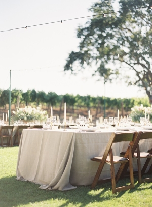 Gray Linen Table Linens and Rustic Wood Chairs