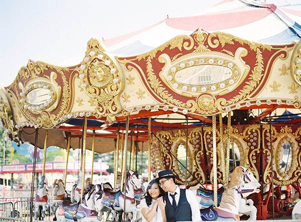 Couple Riding Carousel