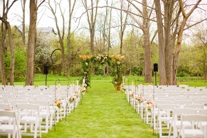 Wooden Ceremony Pergola With Floral Garland