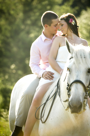 Couple Riding Horse