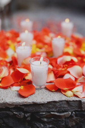 Orange Rose Petals and Candles Ceremony Decor