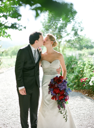 Bride and Groom Kissing in Vineyard From Bret Cole Photography