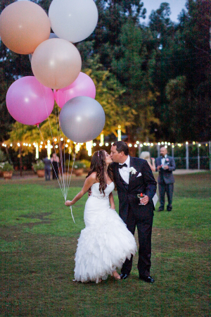 Bride and Groom With Oversize Balloons
