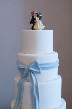White Wedding Cake With Blue Fondant Bow
