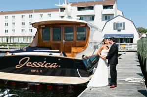 Bride and Groom Kissing Beside Boat