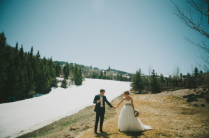 Bride and Groom on Snowy Mountain
