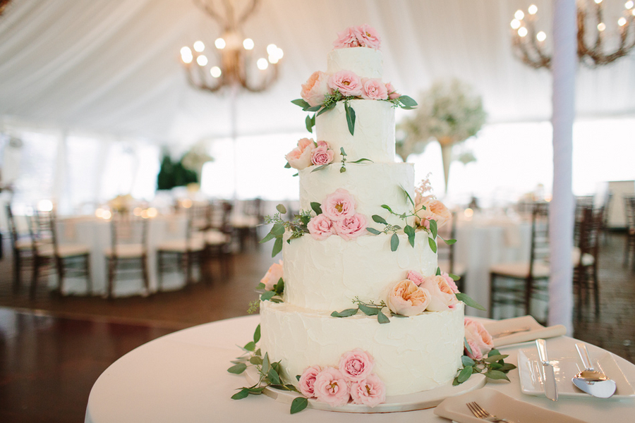 Buttercream Wedding Cake With Pink Roses and Greenery