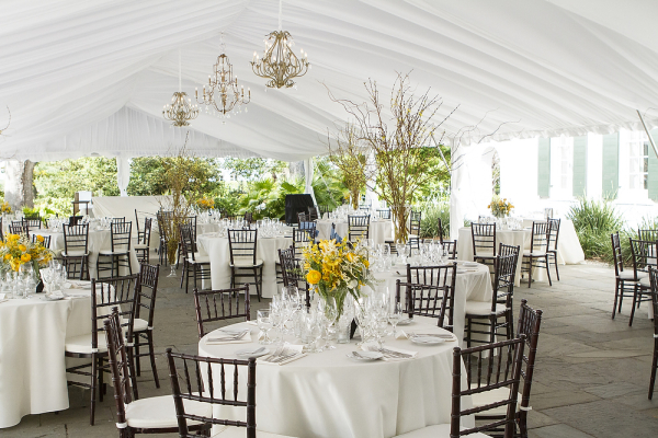 Gold Chandeliers Hanging in Reception Tent