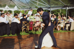 Groom Dipping Bride on Dance Floor