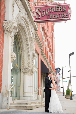 Bride and Groom Beneath Vintage Theater Sign