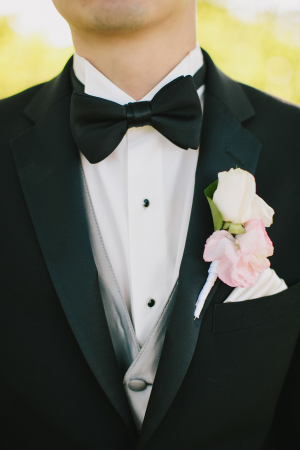 Groom with Double Rose Boutonniere