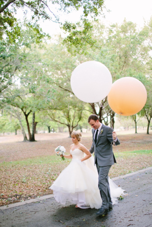 Bride and Groom with Peach Balloons