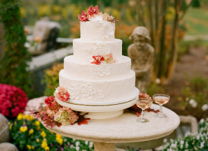 Wedding Cake with Red Flowers