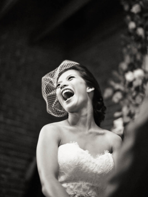 Bride Laughing at Ceremony