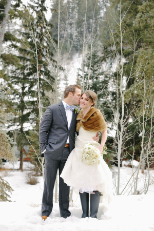 Bride and Groom in Snowy Woods