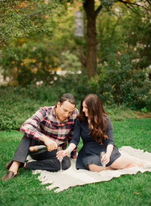 Couple on Picnic Blanket in Park