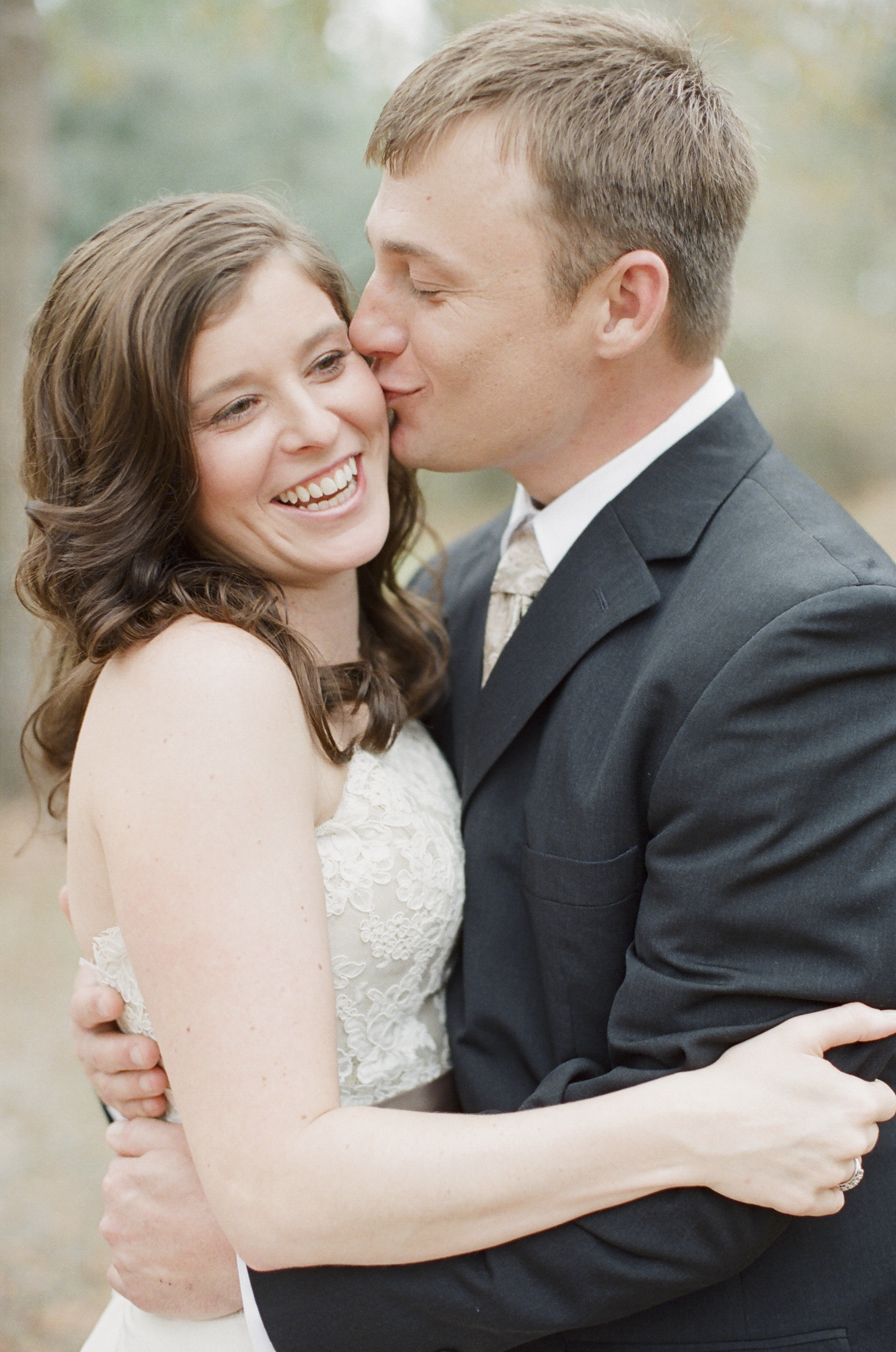 Groom Kissing Bride from Ashley Seawell Photography