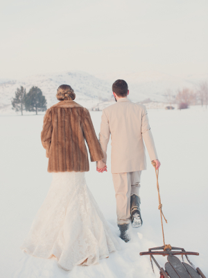 Bride and Groom Walking in Snow