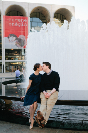 Couple Kissing in Front of Fountain